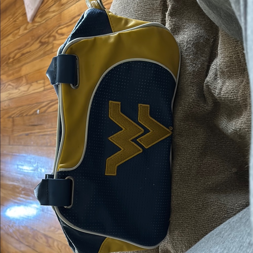 WVU Fandom purse 
Sporty Blue and Yellow purse with 
Graphic Design